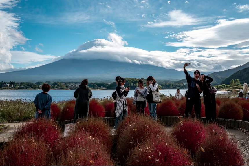 citizens not to visit Japan and threatens military response as Taiwan row escalates