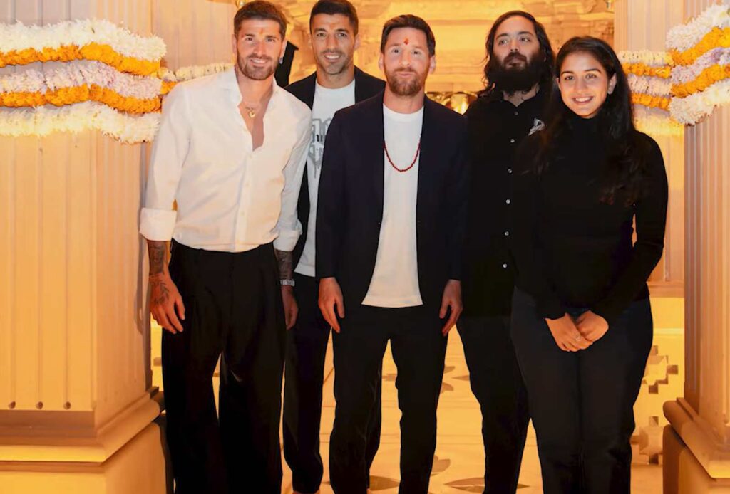 When Anant Ambani and Radhika Merchant welcomed Messi at Vantara, their fashion spoke softly yet clearly. Dressed in sleek, all-black outfits, the look was refined, minimal, and intentionally low-key. Set against Vantara’s natural greens and warm earth tones, their coordinated styling reflected grace without excess.